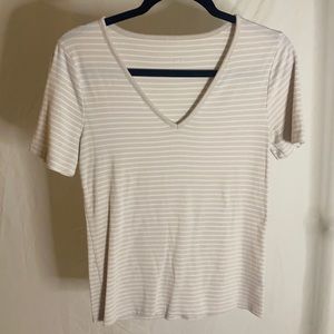 Cream and white striped tee. Size M.